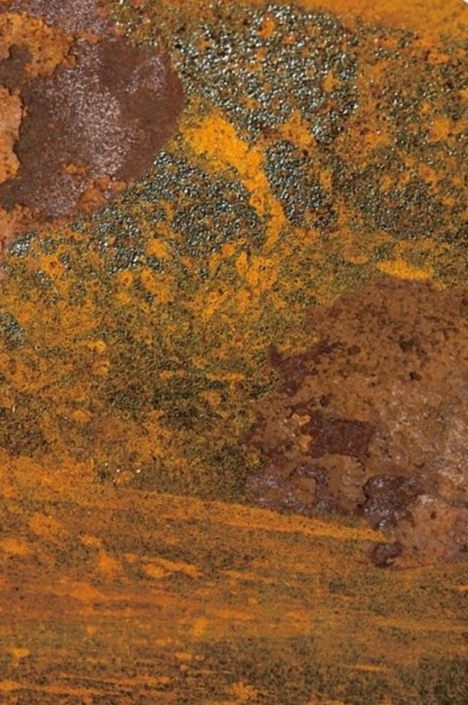 Ilustračný detail skorodovaného kovového povrchu